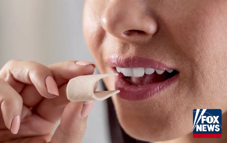 Woman chewing aspartame gum