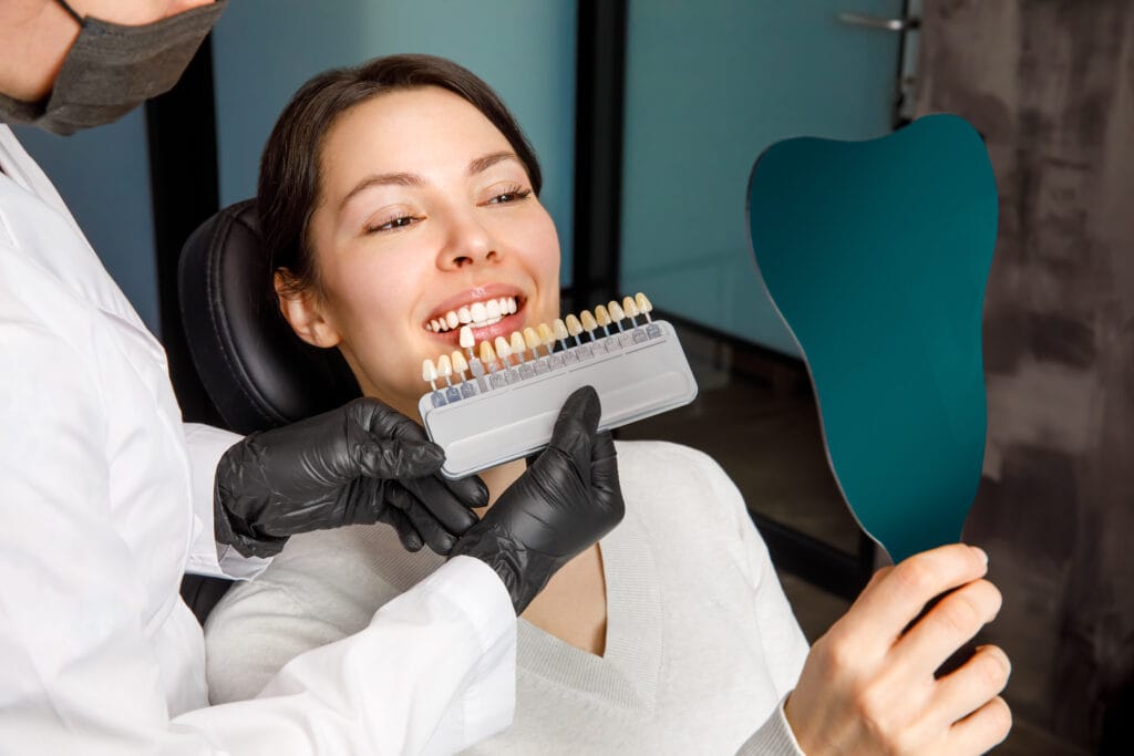 Smiling young woman in a dental office